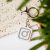 Instagram NFC kulcstartó Kőhatású - Szürke